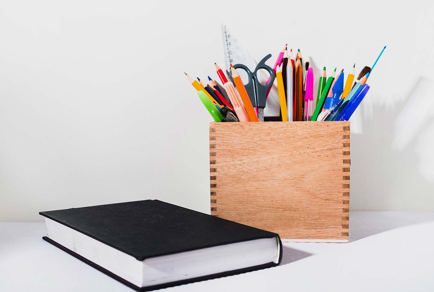 Pens pencils erasers notebooks rulers are common stationery items used